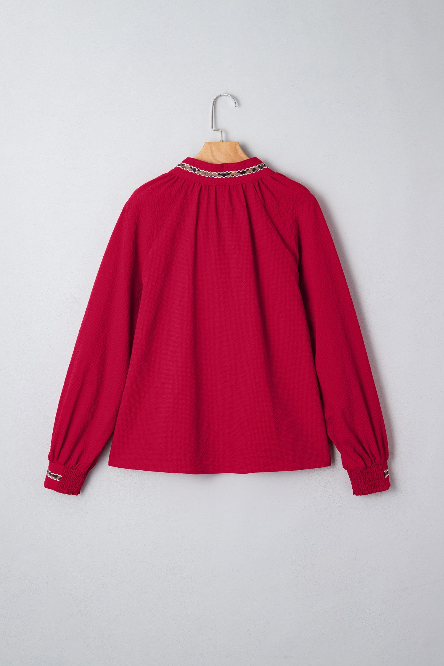 Racing Red Leopard Jacquard Print V Neck Textured Blouse by Wild and Free Boutique