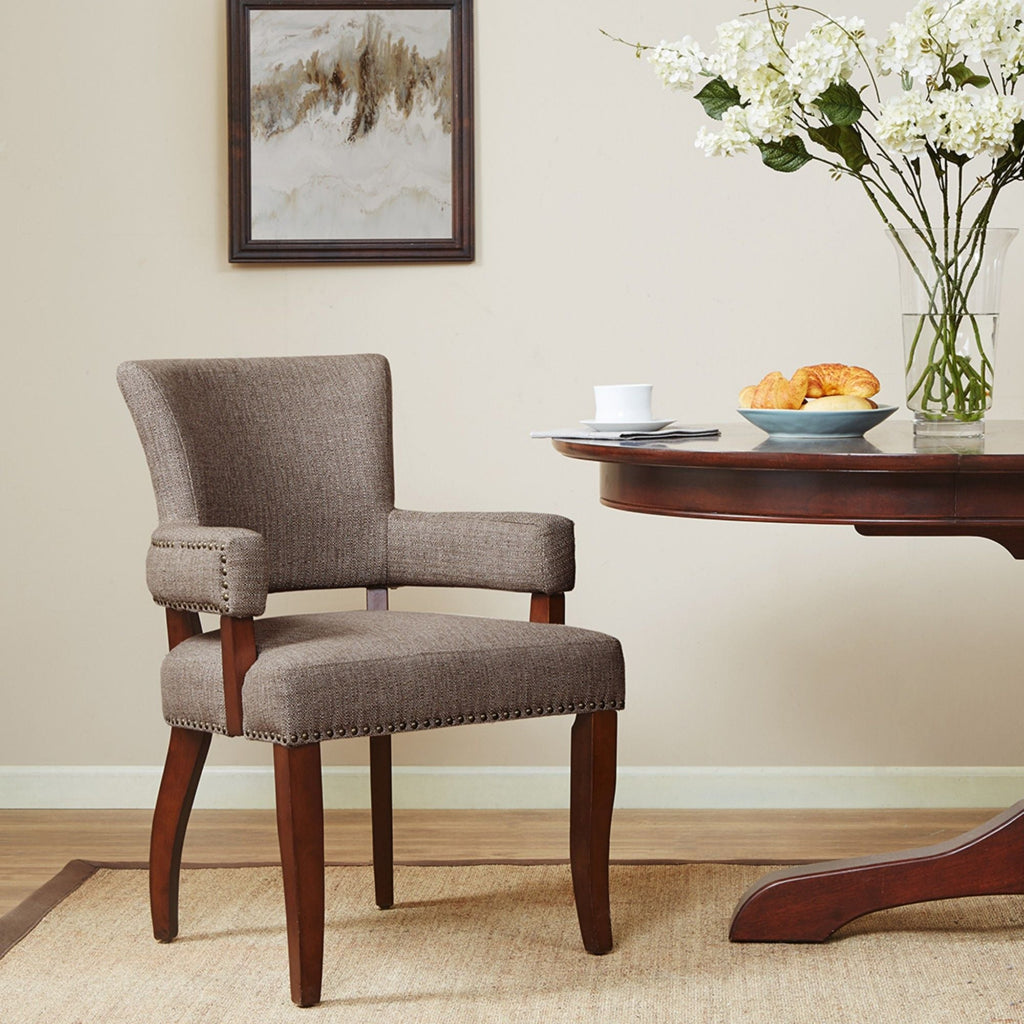 Elegant Arm Dining Chair With Brass Nail Head Detailing by Unique Piece Furniture