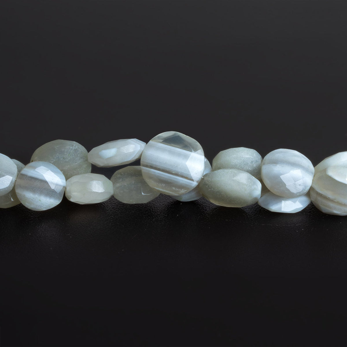 10-13mm Denim Opal Faceted Coins 8 inch 17 beads by The Bead Traders
