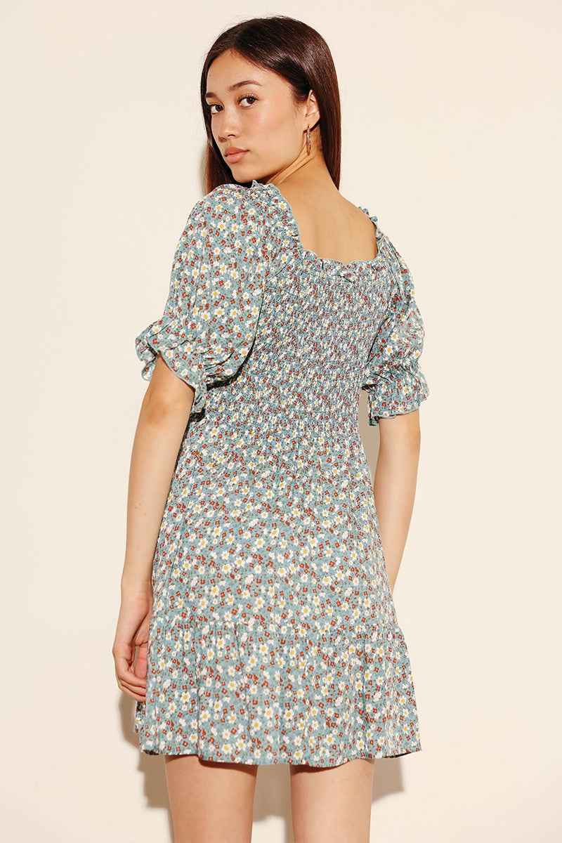 Floral smocked dress by Miss Sparkling
