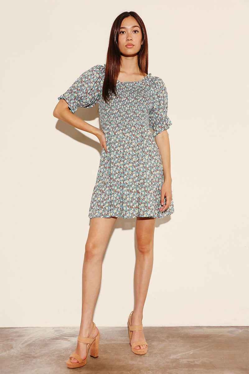 Floral smocked dress by Miss Sparkling