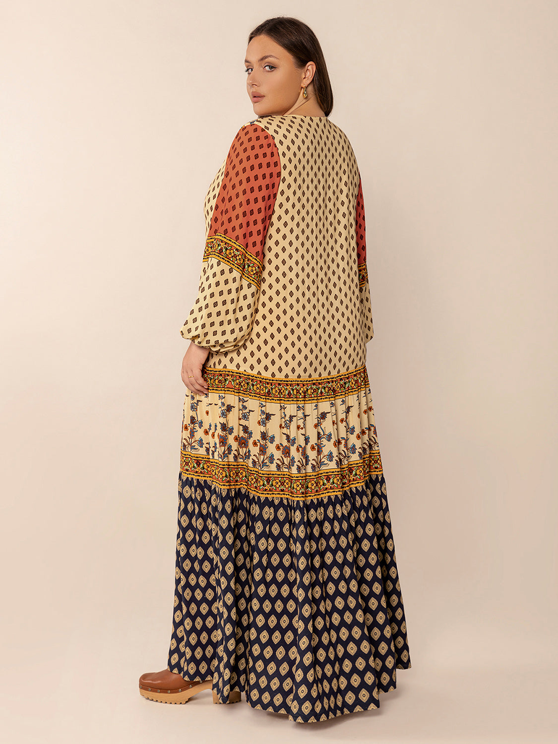 Plus Size Printed V-Neck Long Sleeve Maxi Dress by Wild and Free Boutique