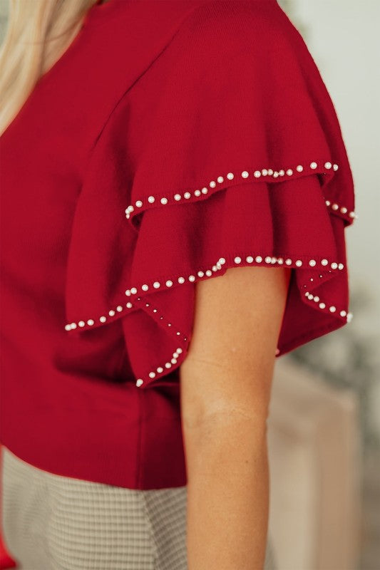 Solid Pearl Embellished Ruffle Sleeve Sweater by The Diamond Empire LLC
