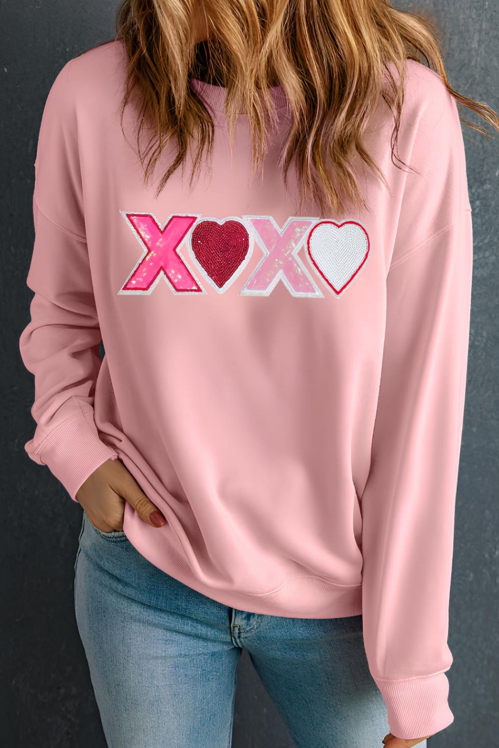 Valentine’s Day XOXO Round Neck Long Sleeve Sweatshirt by Wild and Free Boutique