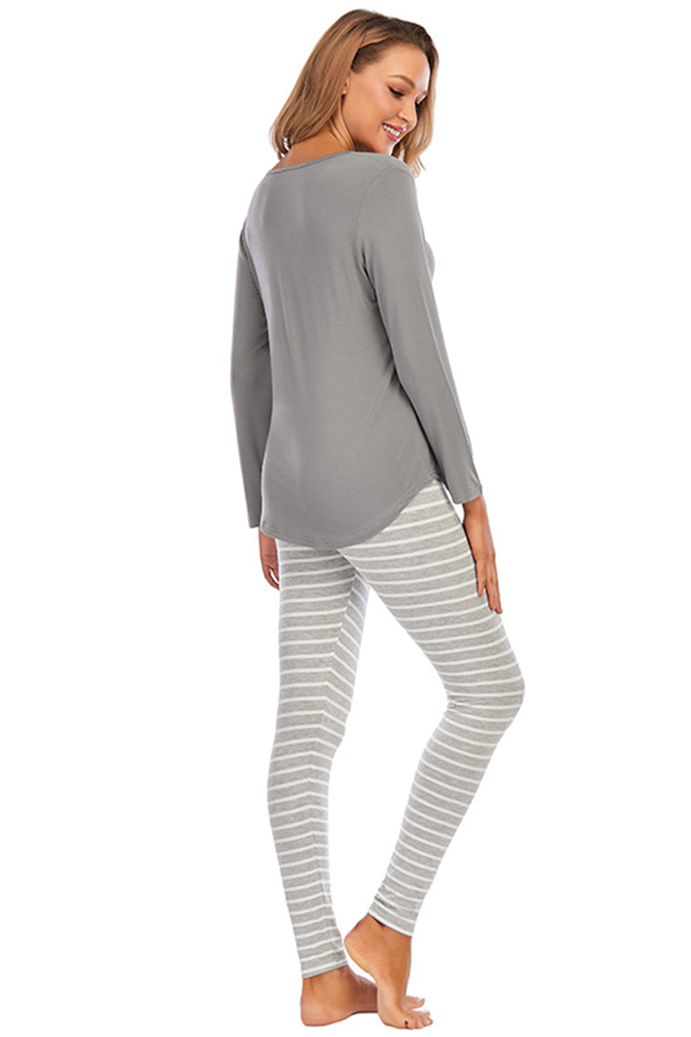 Graphic Round Neck Top and Striped Pants Set by Wild and Free Boutique