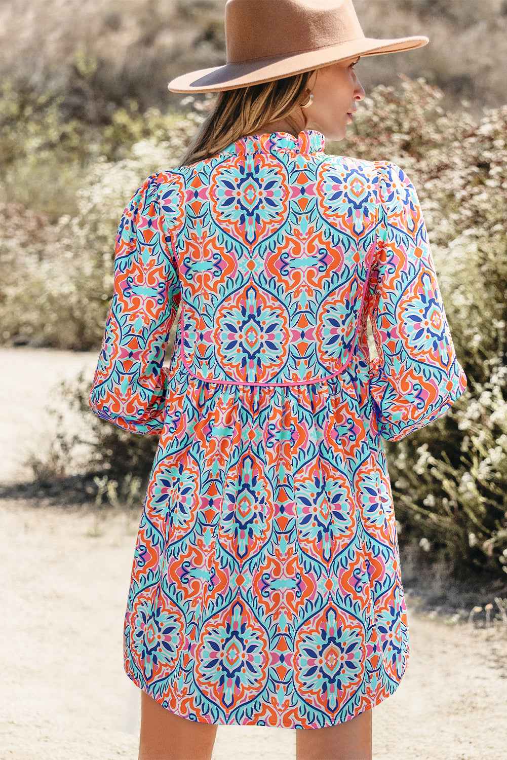 Sky Blue Abstract Printed Long Sleeve Tied Neckline Mini Dress by Wild and Free Boutique