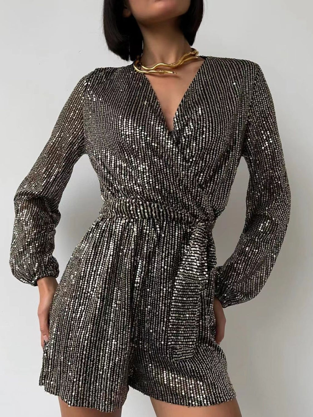 Full Size Sequin Surplice Tie Waist Long Sleeve Romper by Wild and Free Boutique