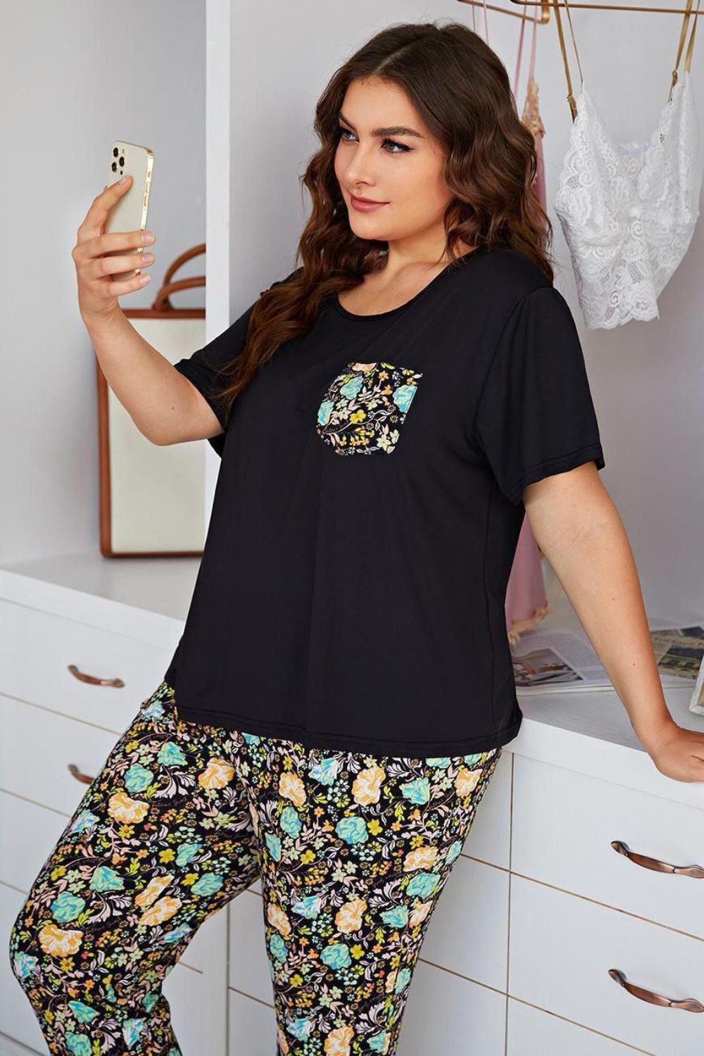 Plus Size Contrast Round Neck Tee and Floral Pants Lounge Set by Wild and Free Boutique