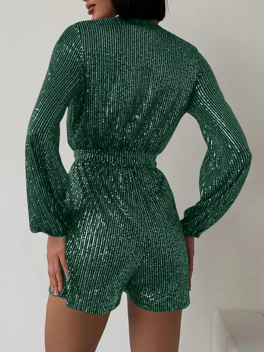 Full Size Sequin Surplice Tie Waist Long Sleeve Romper by Wild and Free Boutique
