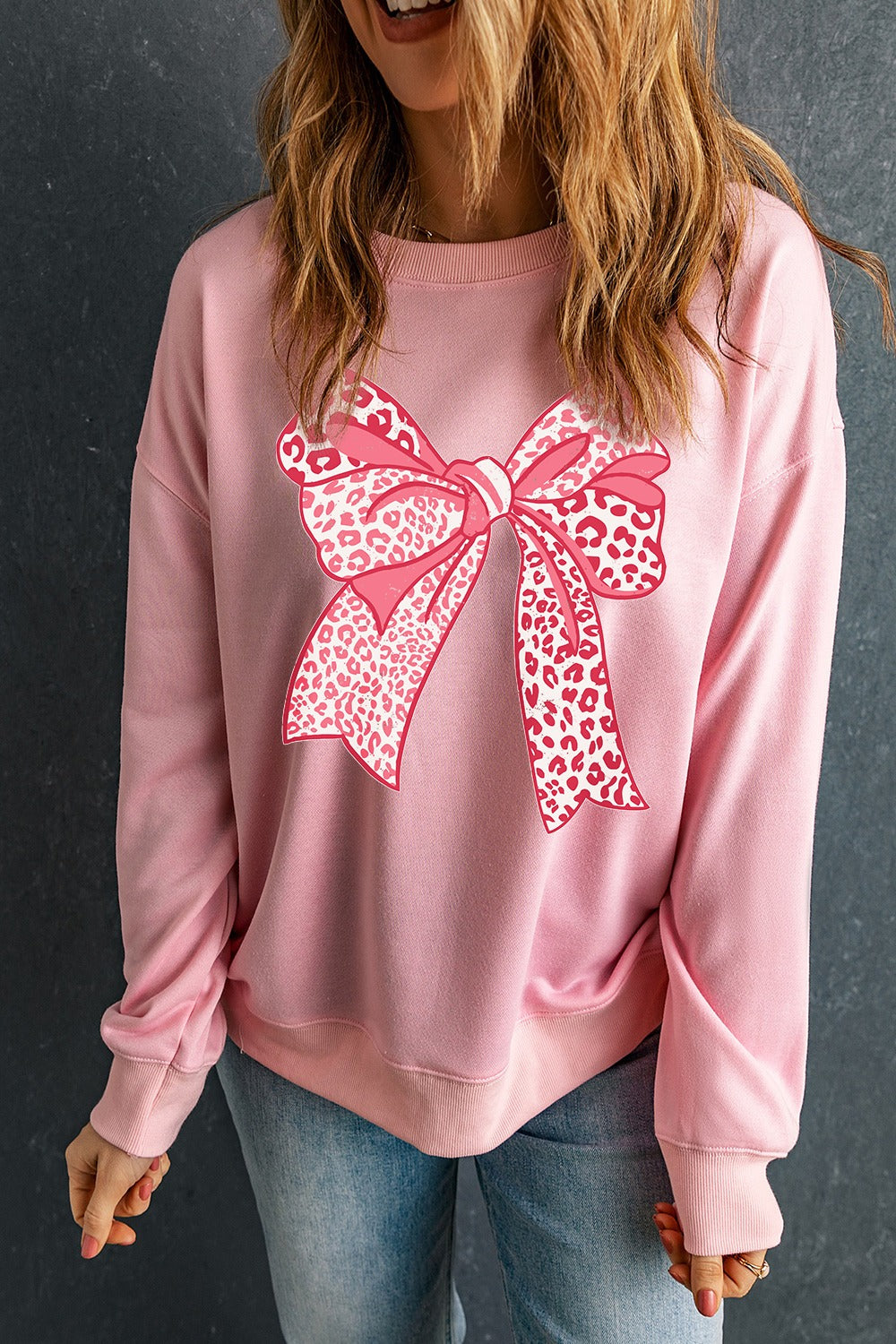 Bow Graphic Round Neck Long Sleeve Sweatshirt by Wild and Free Boutique