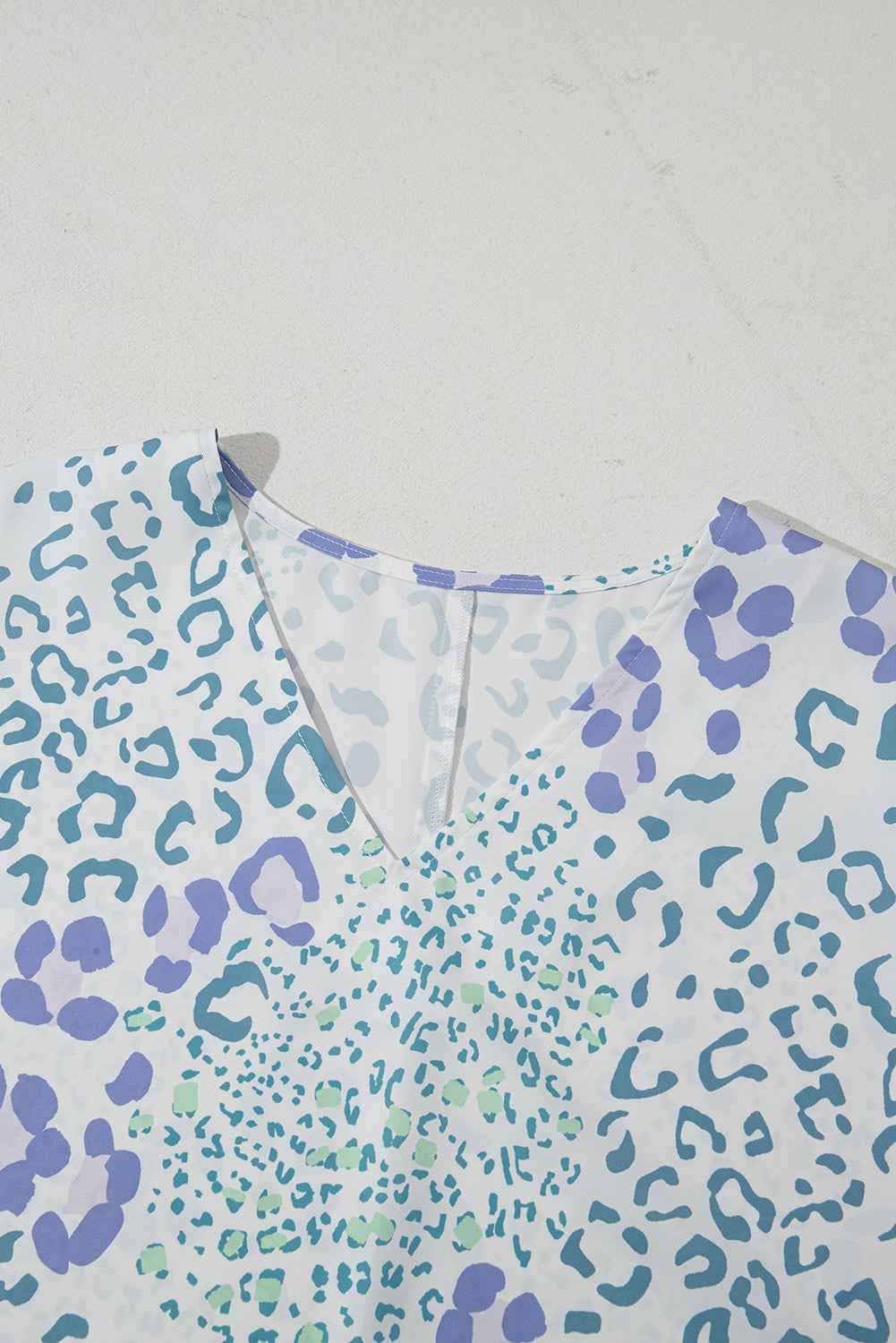 Sky Blue Mixed Leopard Print V Neck Short Sleeve Blouse by Wild and Free Boutique