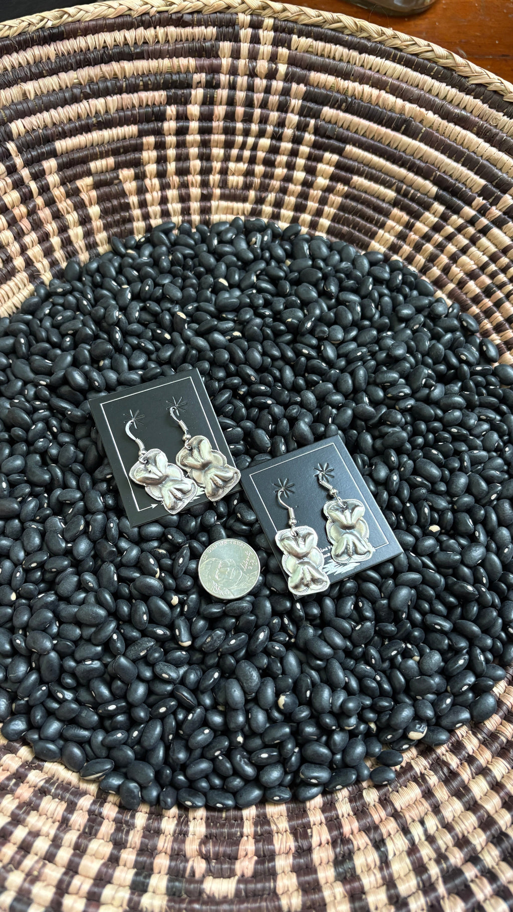 PLAIN BOW TIE CONCHO DANGLE EARRINGS BY JOAN BEGAY by The Sterling Spur