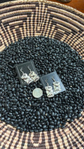 PLAIN BOW TIE CONCHO DANGLE EARRINGS BY JOAN BEGAY by The Sterling Spur