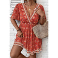 Orange Plus Size Printed Surplice Neck Empire Waist Flowy Mini Dress by Wild and Free Boutique