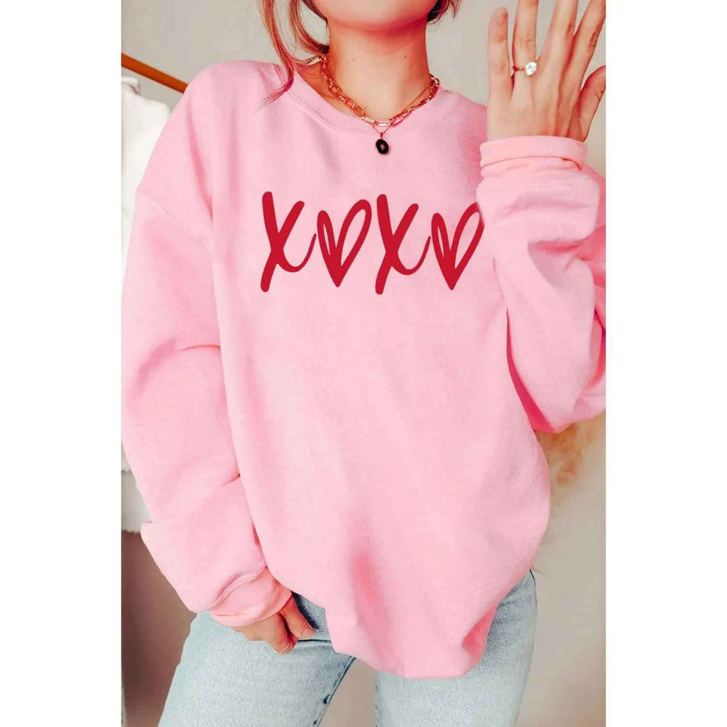 Valentine’s Day XOXO Round Neck Drop Shoulder Sweatshirt by Wild and Free Boutique