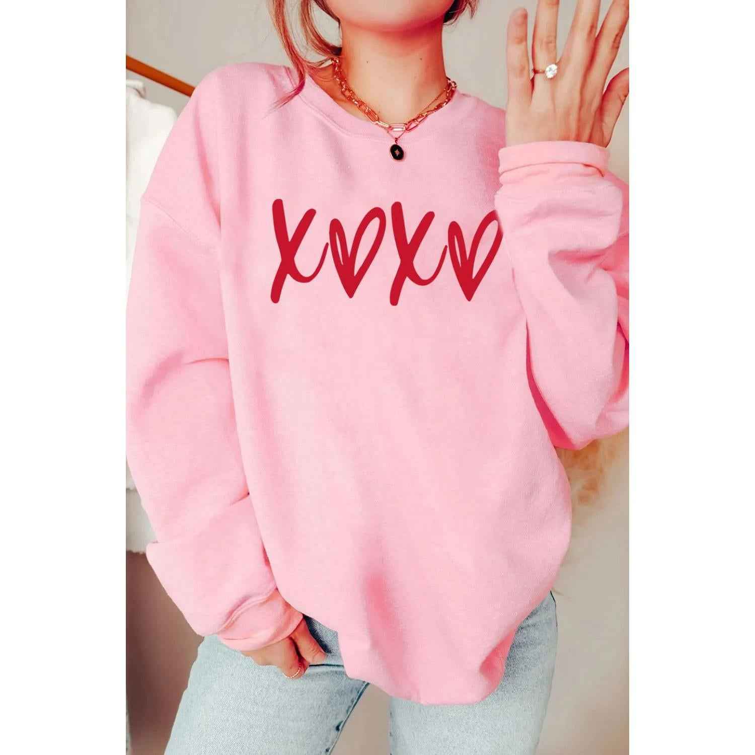 Valentine’s Day XOXO Round Neck Drop Shoulder Sweatshirt by Wild and Free Boutique