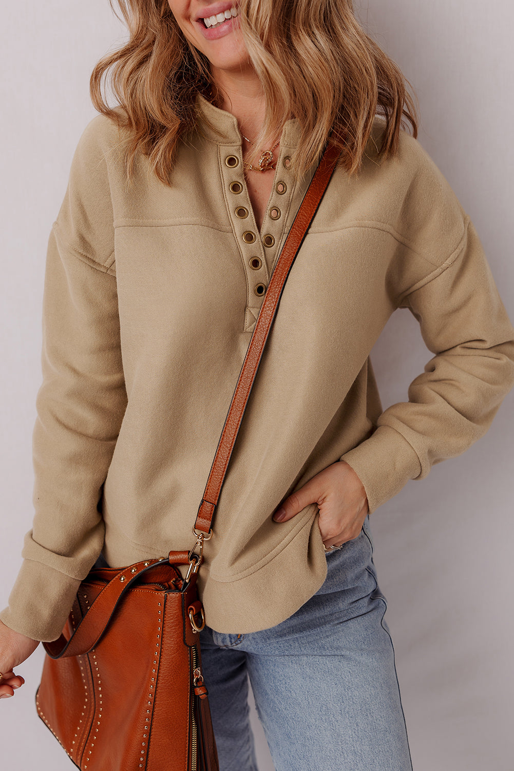 Elina French Grommet Detail Sweatshirt by Threaded Pear