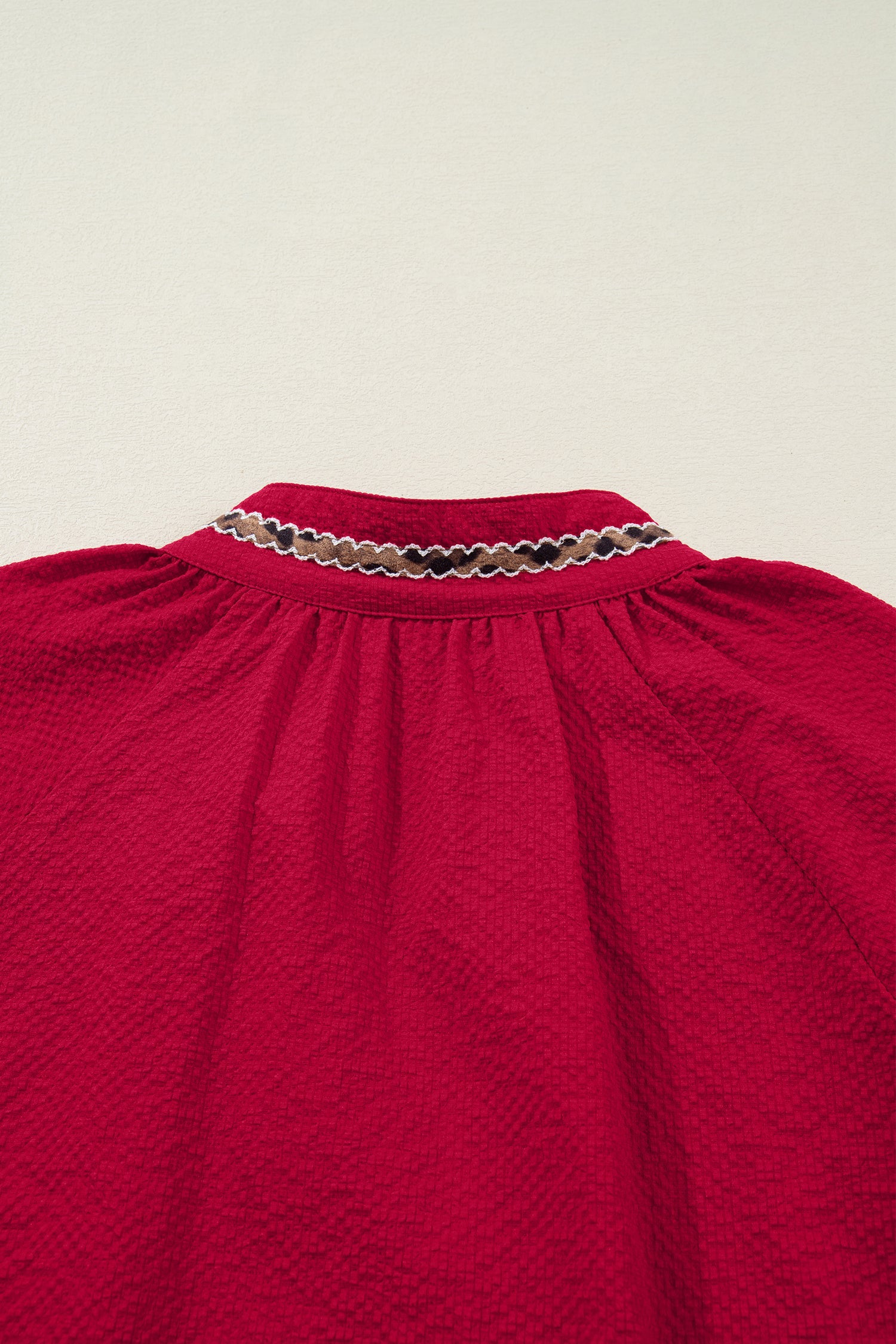 Racing Red Leopard Jacquard Print V Neck Textured Blouse by Wild and Free Boutique