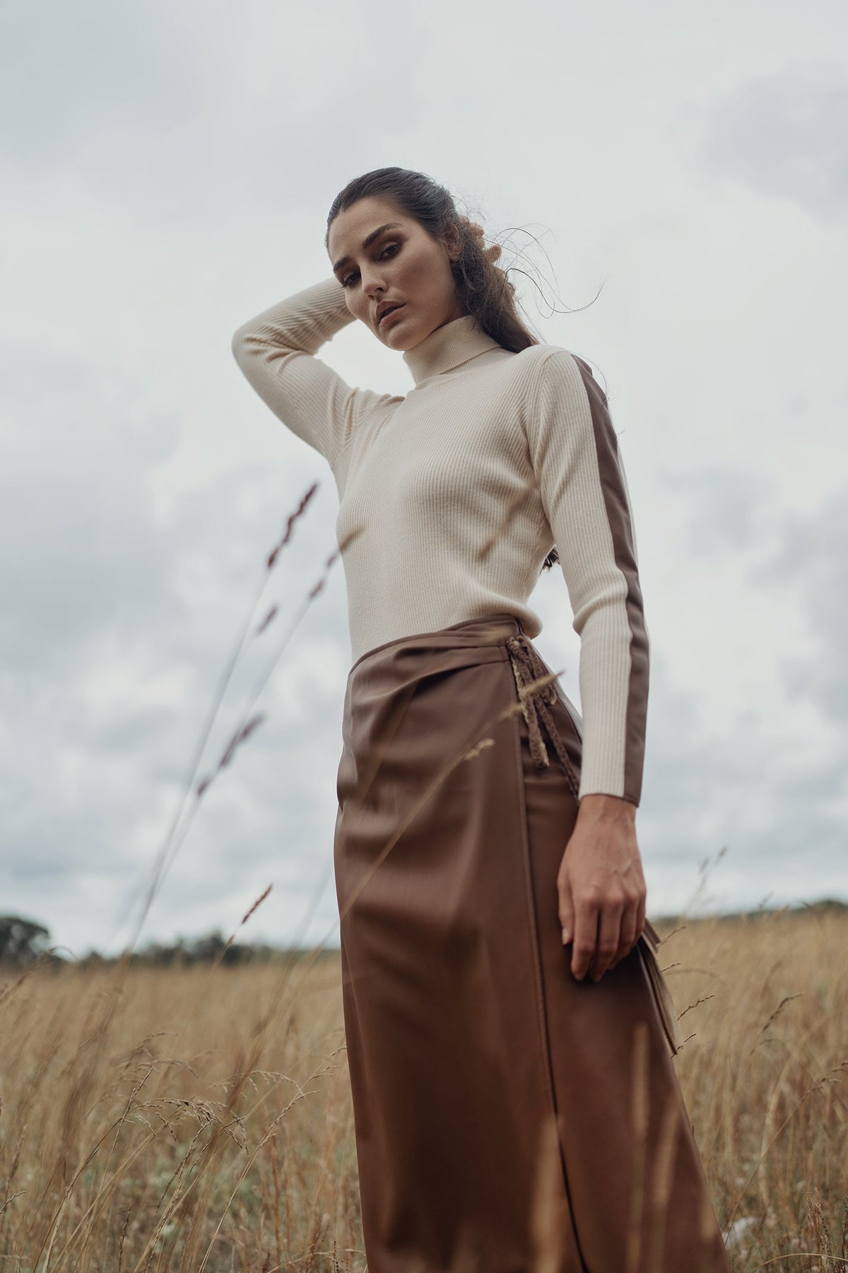 LEATHER FAUX WRAP SKIRT by profile-nyc
