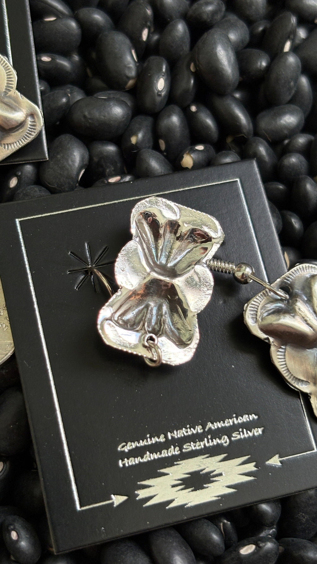PLAIN BOW TIE CONCHO DANGLE EARRINGS BY JOAN BEGAY by The Sterling Spur