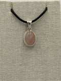 Sterling Silver Bezeled Oval Rose Quartz Pendant by Sacred Crystals