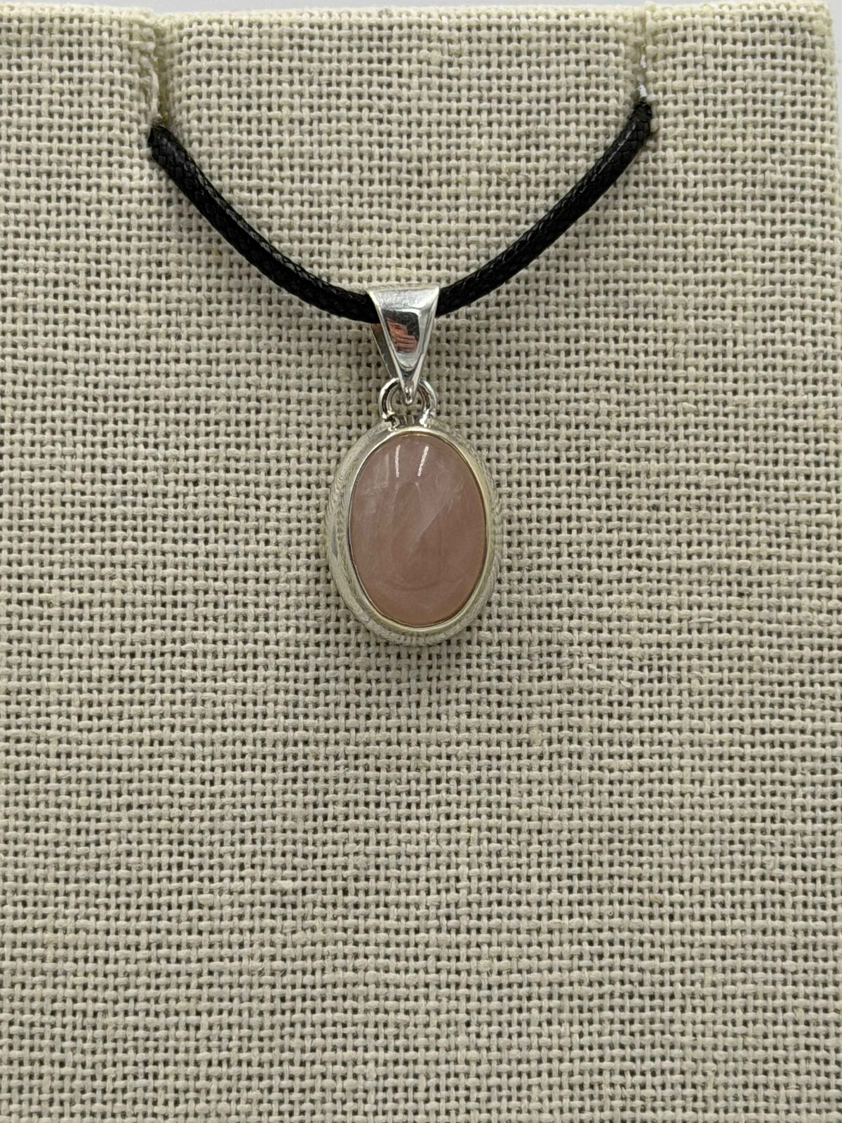 Sterling Silver Bezeled Oval Rose Quartz Pendant by Sacred Crystals