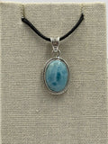 Sterling Silver Bezeled Oval Larimar Pendant by Sacred Crystals