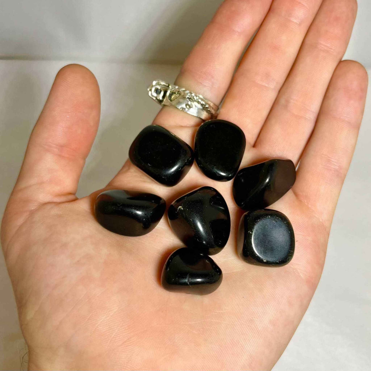 Black Obsidian Tumbled Pocket Stone by Sacred Crystals