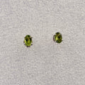 Sterling Silver Oval Peridot Post Earrings Size 4 by Sacred Crystals
