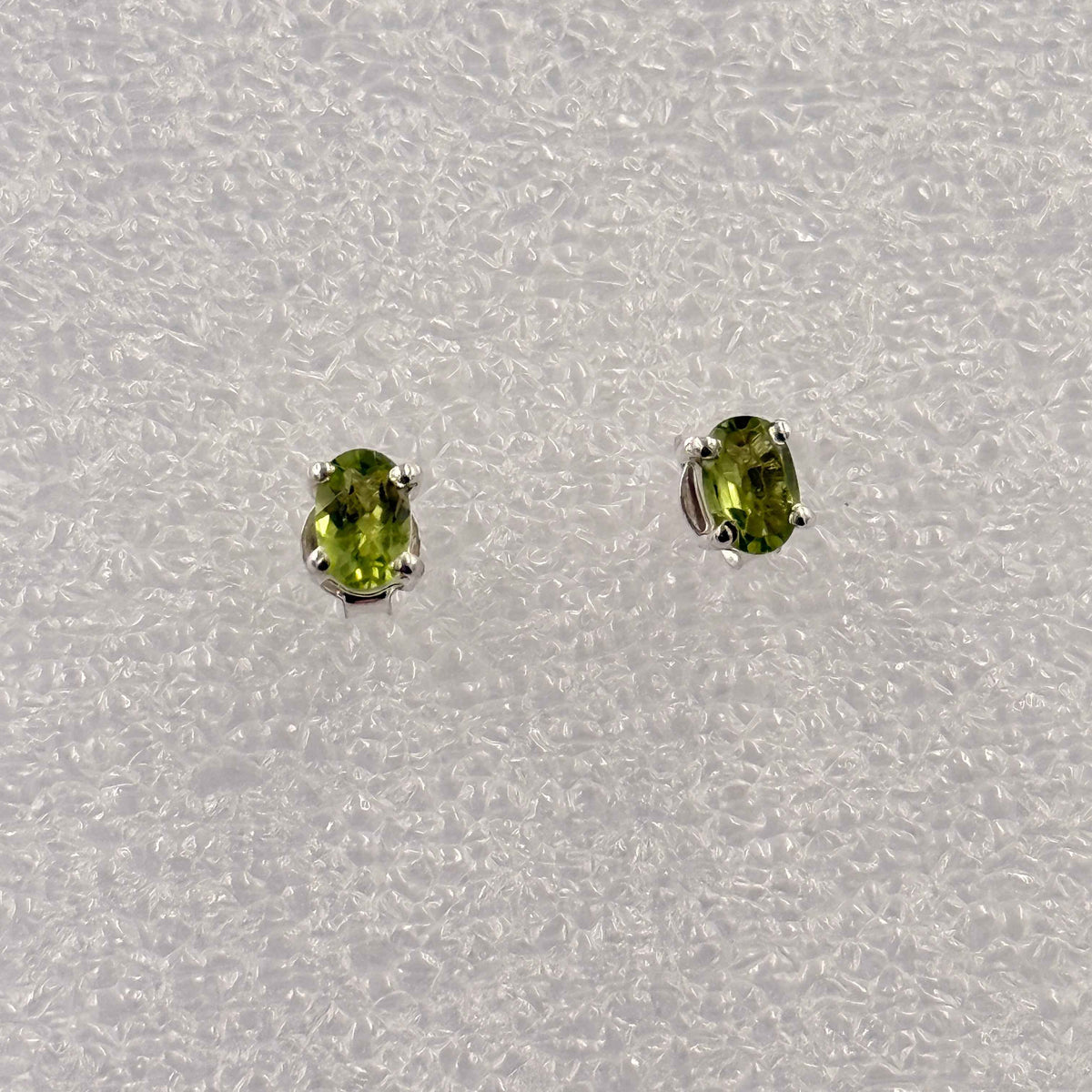Sterling Silver Oval Peridot Post Earrings Size 4 by Sacred Crystals