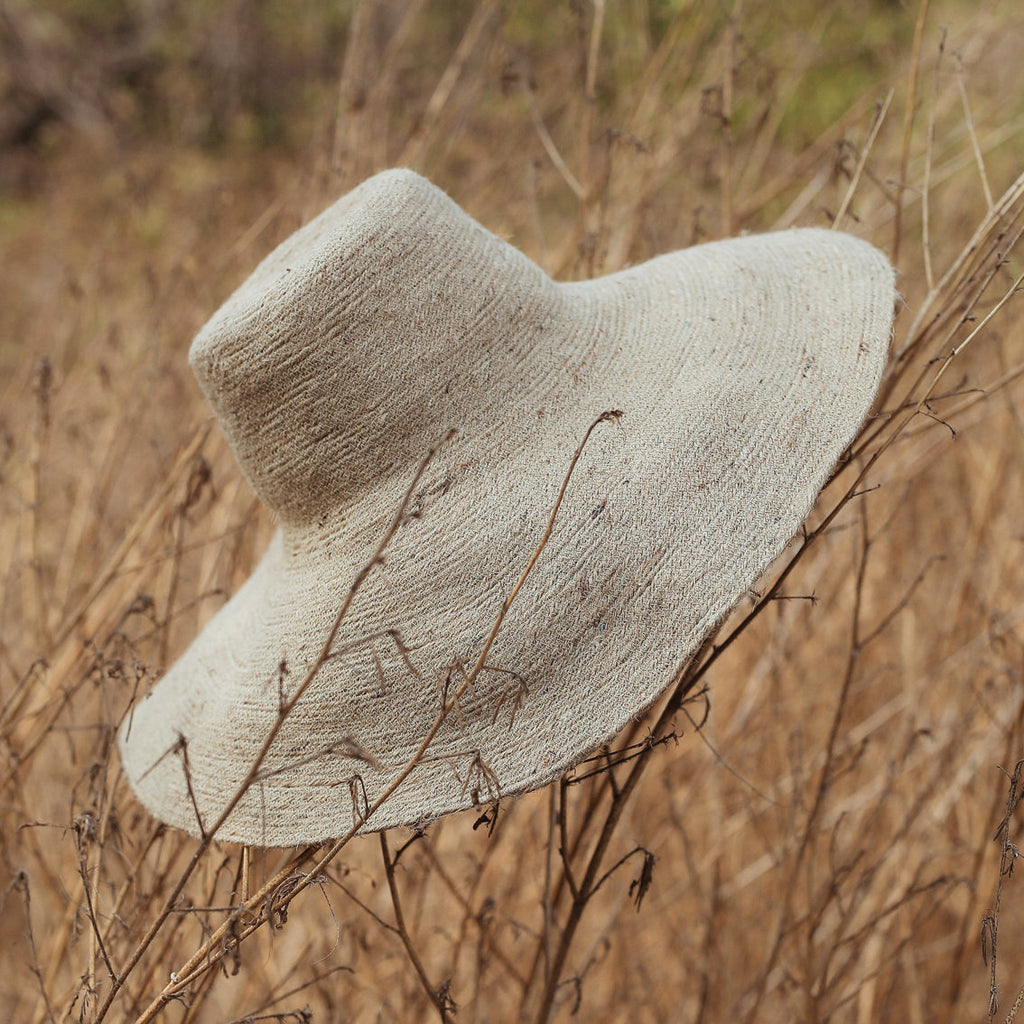The Riri Jute Handwoven Straw Hat In Beige by BrunnaCo