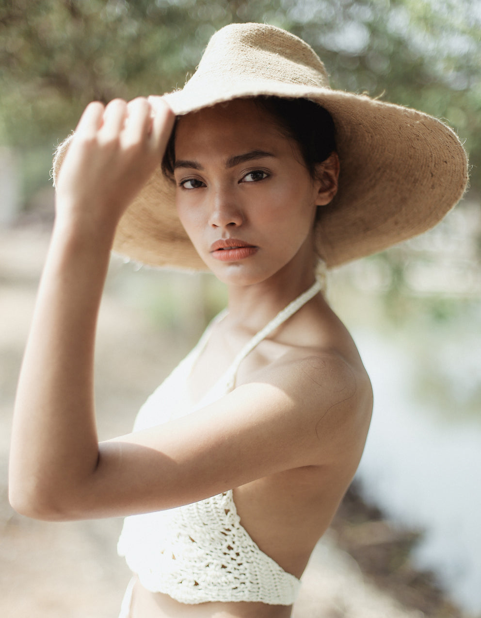 The Riri Jute Handwoven Straw Hat In Beige by BrunnaCo