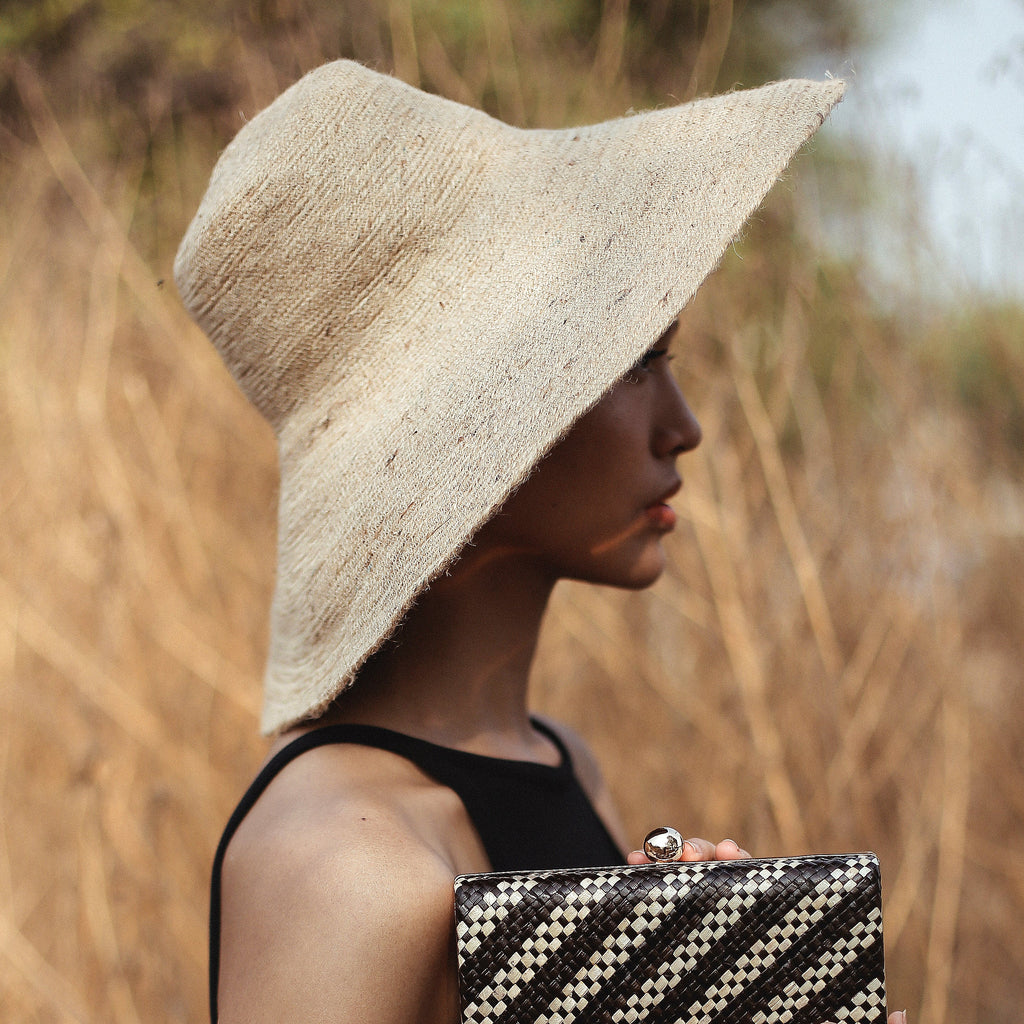 The Riri Jute Handwoven Straw Hat In Beige by BrunnaCo