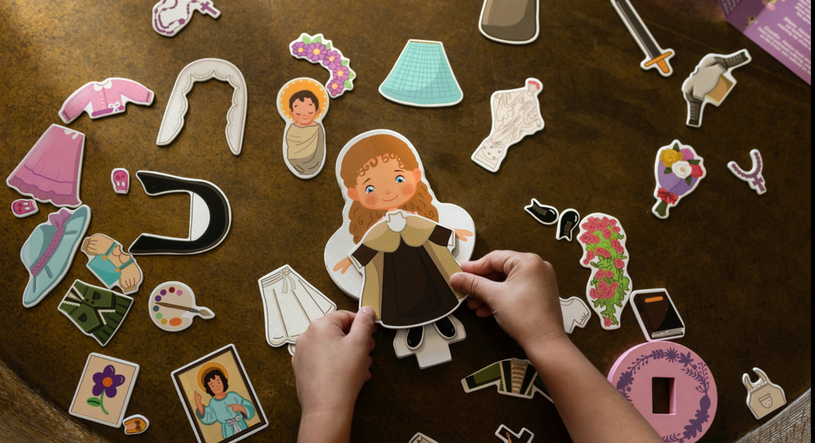 My Saint Thérèse, A magnetic wooden dress-up doll set by Saintly Heart