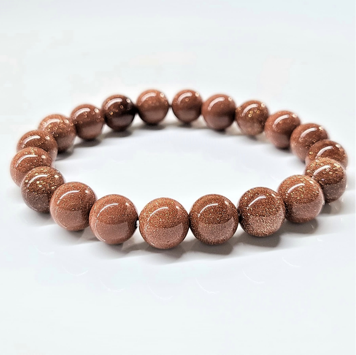 Goldstone Round Bead Bracelet - Stone of Earthly Spirit Connection by Sacred Crystals