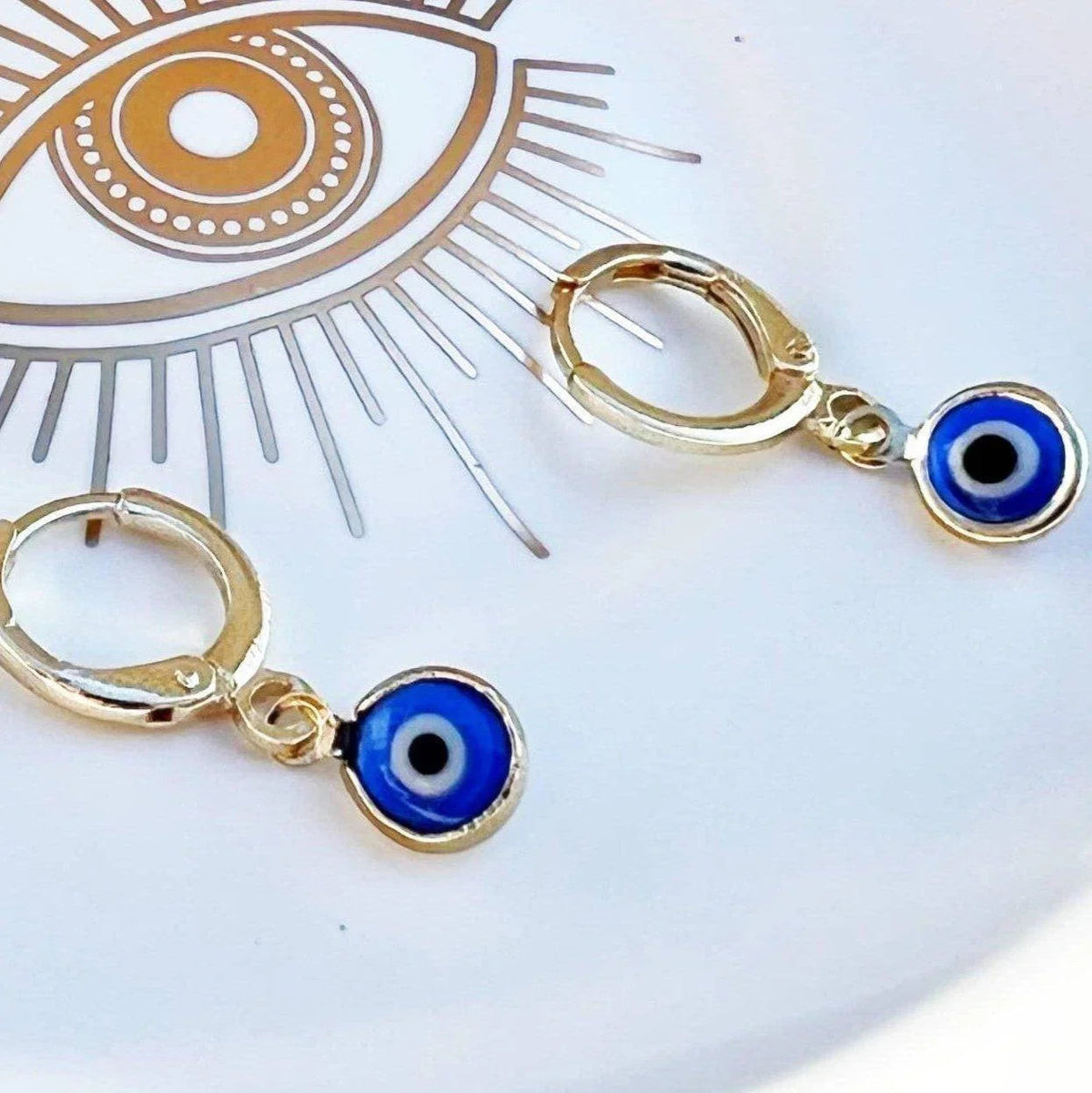 Glass Evil Eye Huggie Earrings by Classic Variable