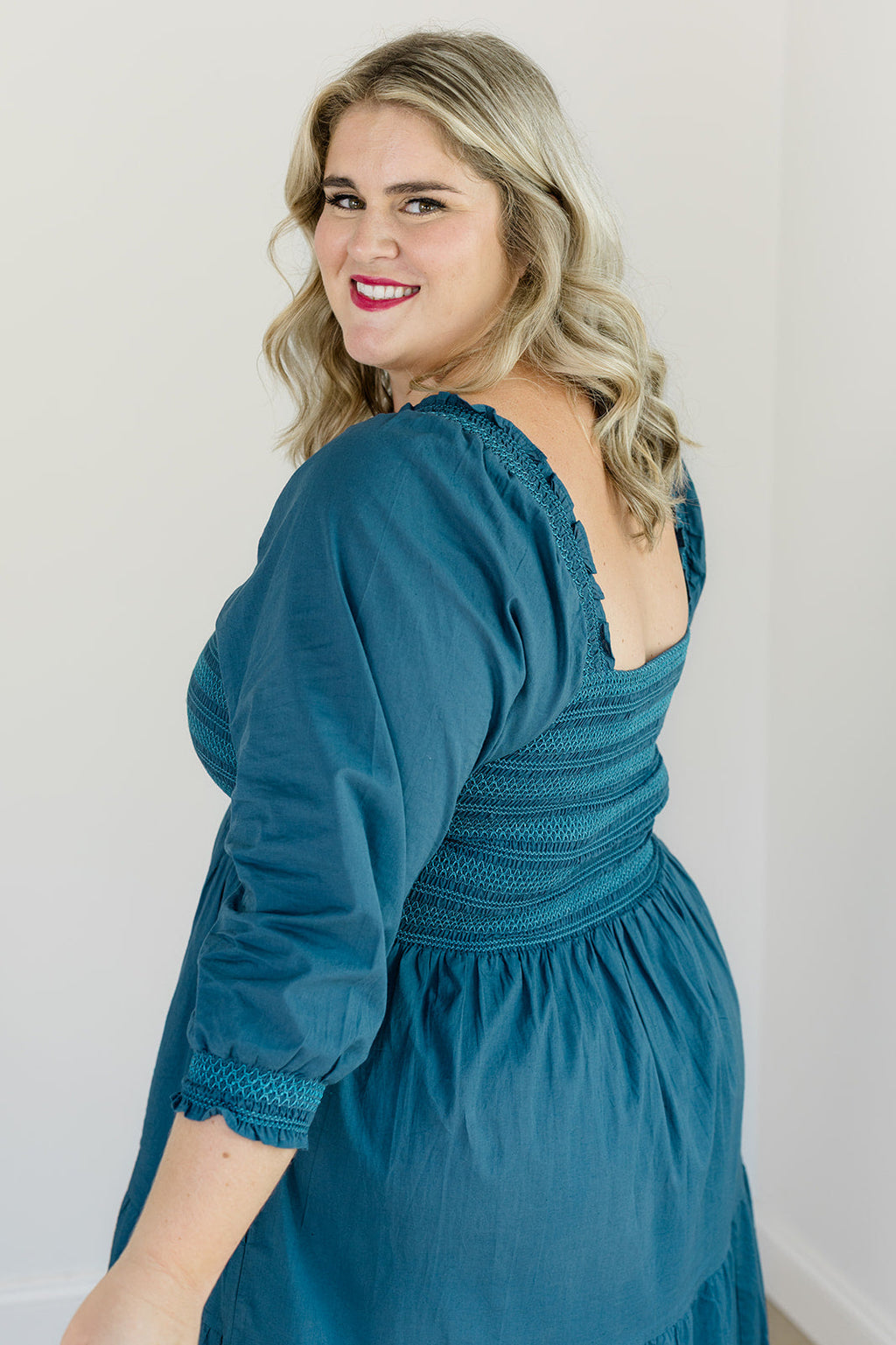 The Jenna Dress in Teal by Carla Kiley Collection