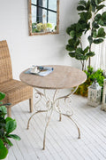 Round Wooden Table With Metal Scrollwork Legs - White Washed by Unique Piece Furniture