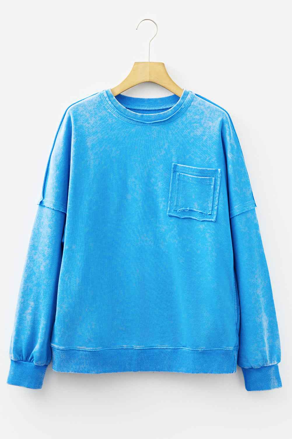 Blue Mineral Wash Raw Seam Double Patched Pocket Pullover Sweatshirt by Wild and Free Boutique
