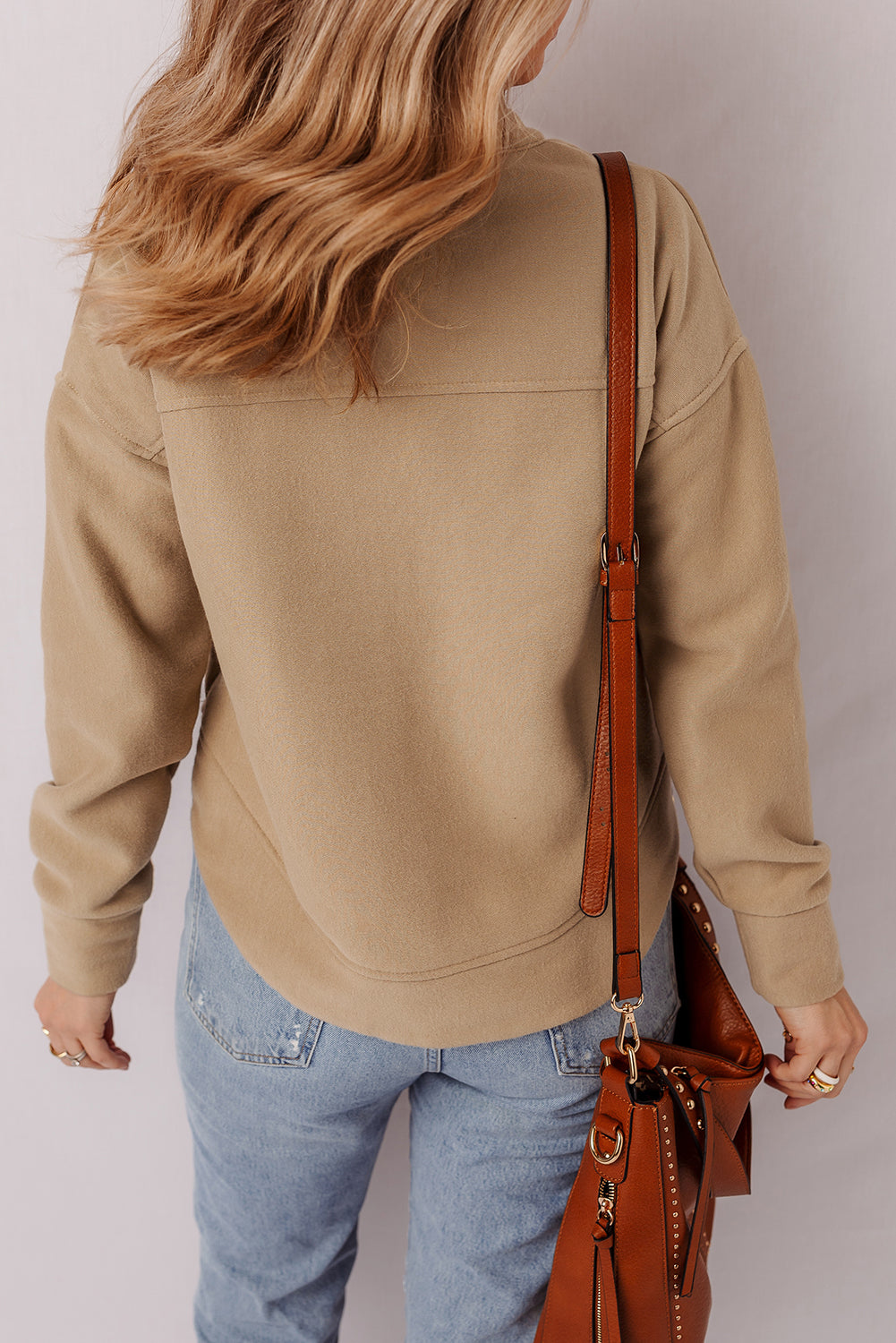 Elina French Grommet Detail Sweatshirt by Threaded Pear