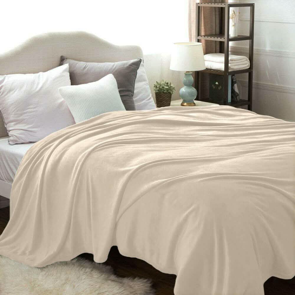 Kathy Ireland Flannel Solid Microplush Bed Blankets by DailySale