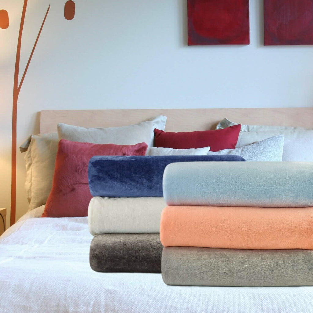 Kathy Ireland Flannel Solid Microplush Bed Blankets by DailySale