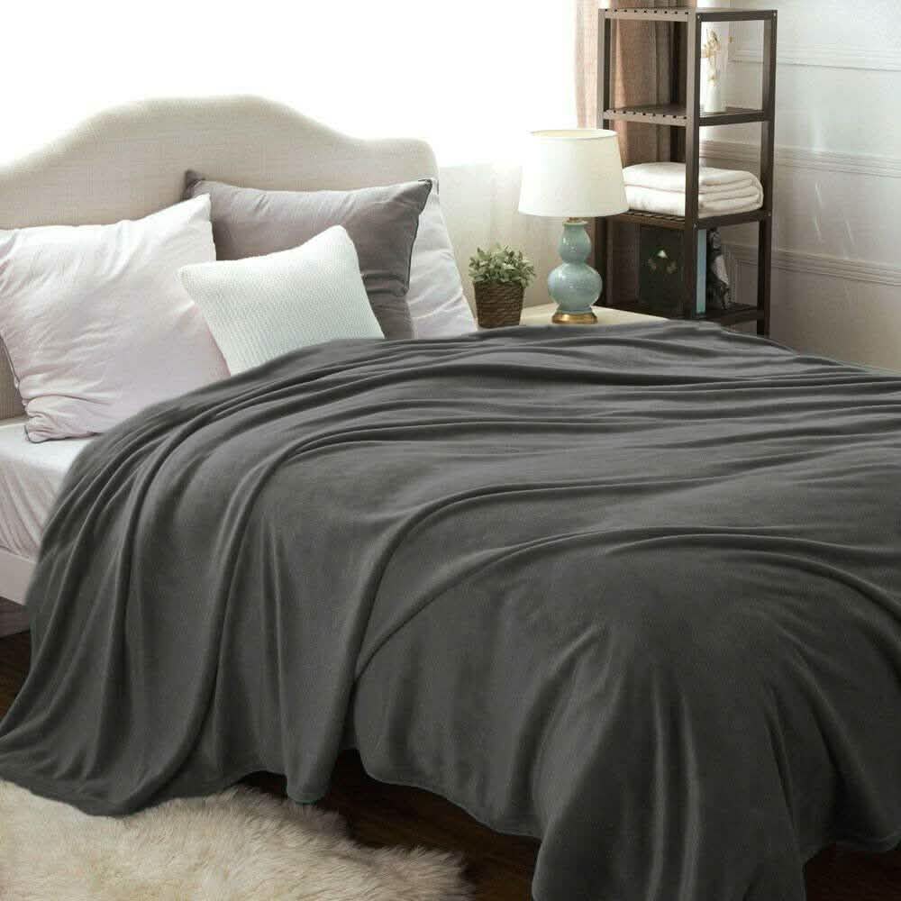 Kathy Ireland Flannel Solid Microplush Bed Blankets by DailySale