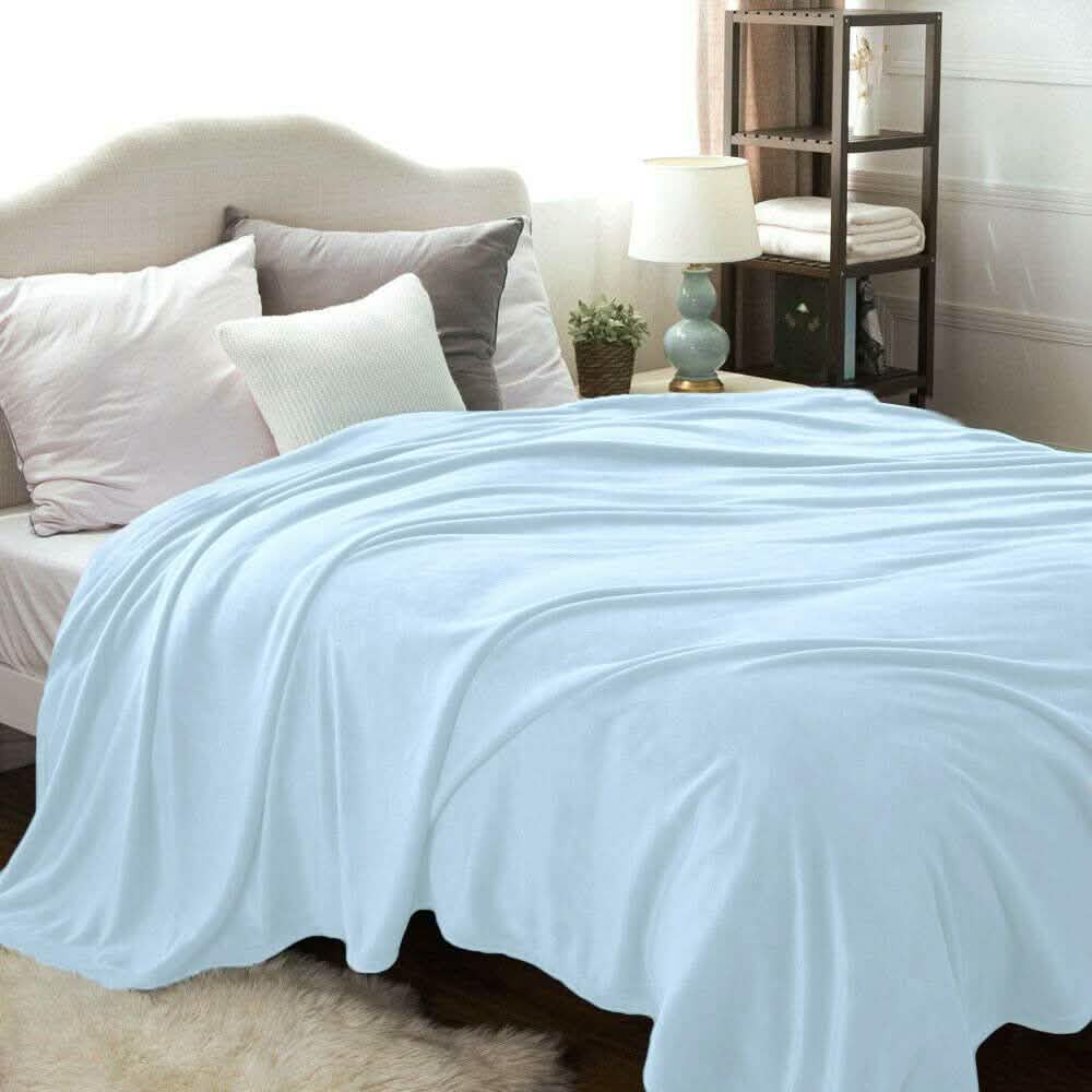 Kathy Ireland Flannel Solid Microplush Bed Blankets by DailySale