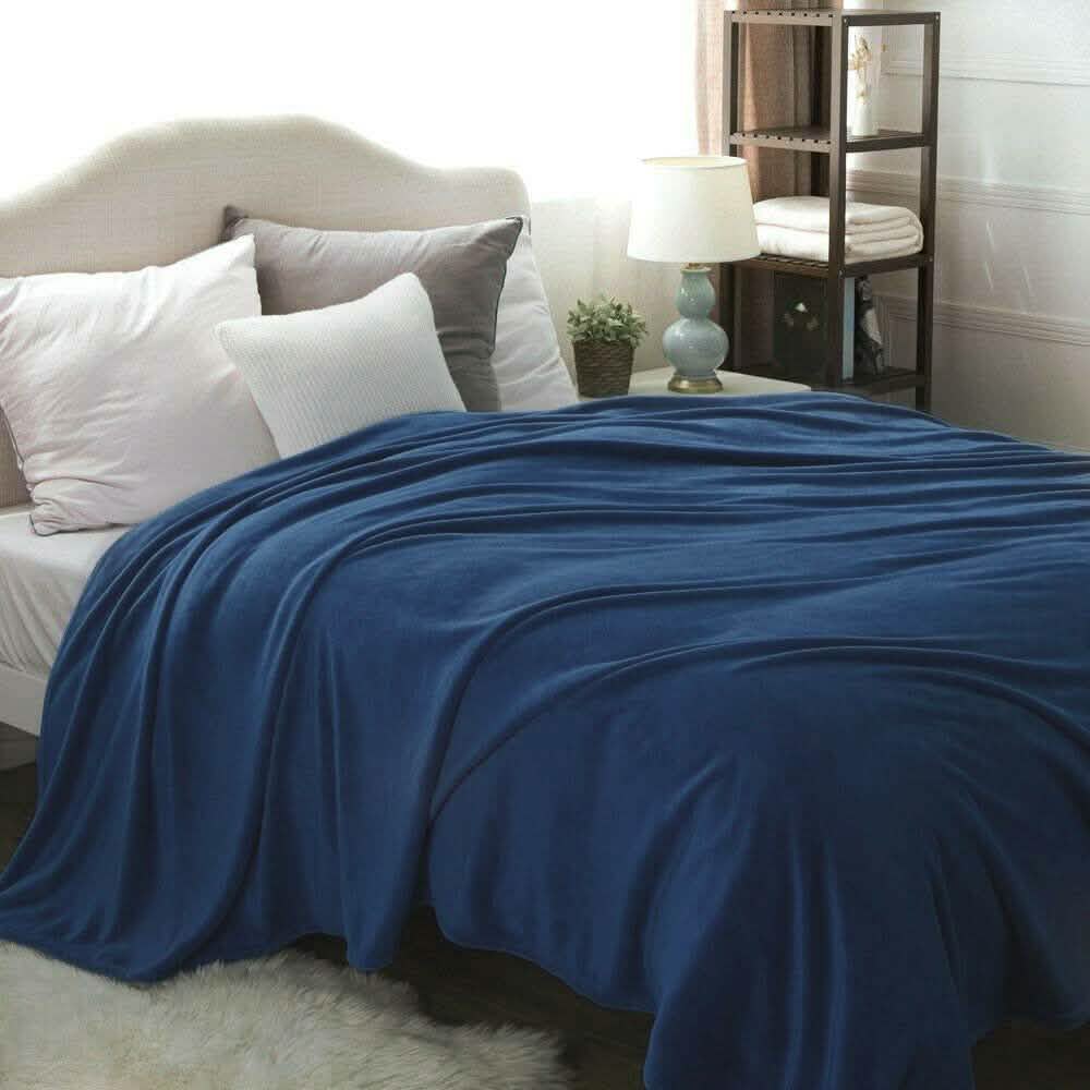 Kathy Ireland Flannel Solid Microplush Bed Blankets by DailySale
