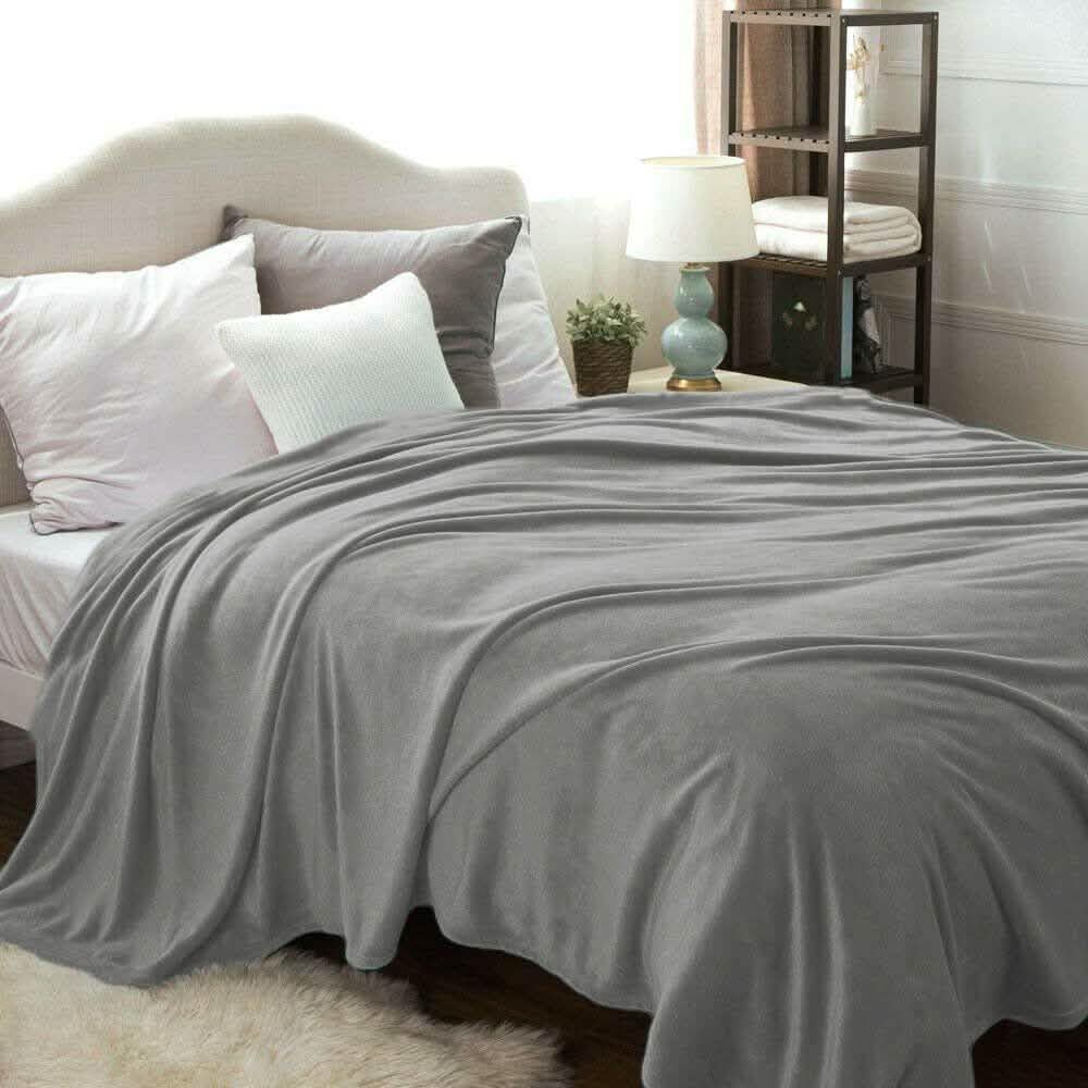 Kathy Ireland Flannel Solid Microplush Bed Blankets by DailySale