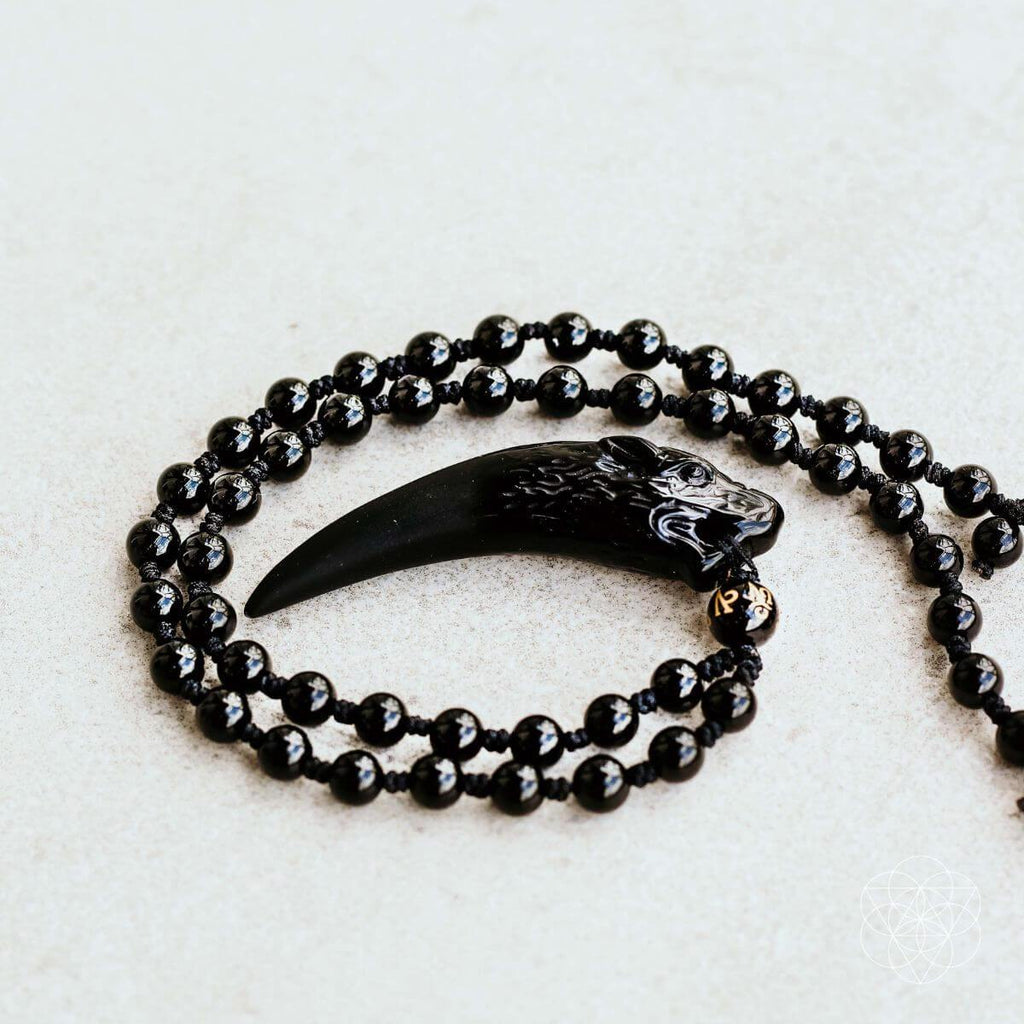 The Obsidian Wolf Pendant by Conscious Items
