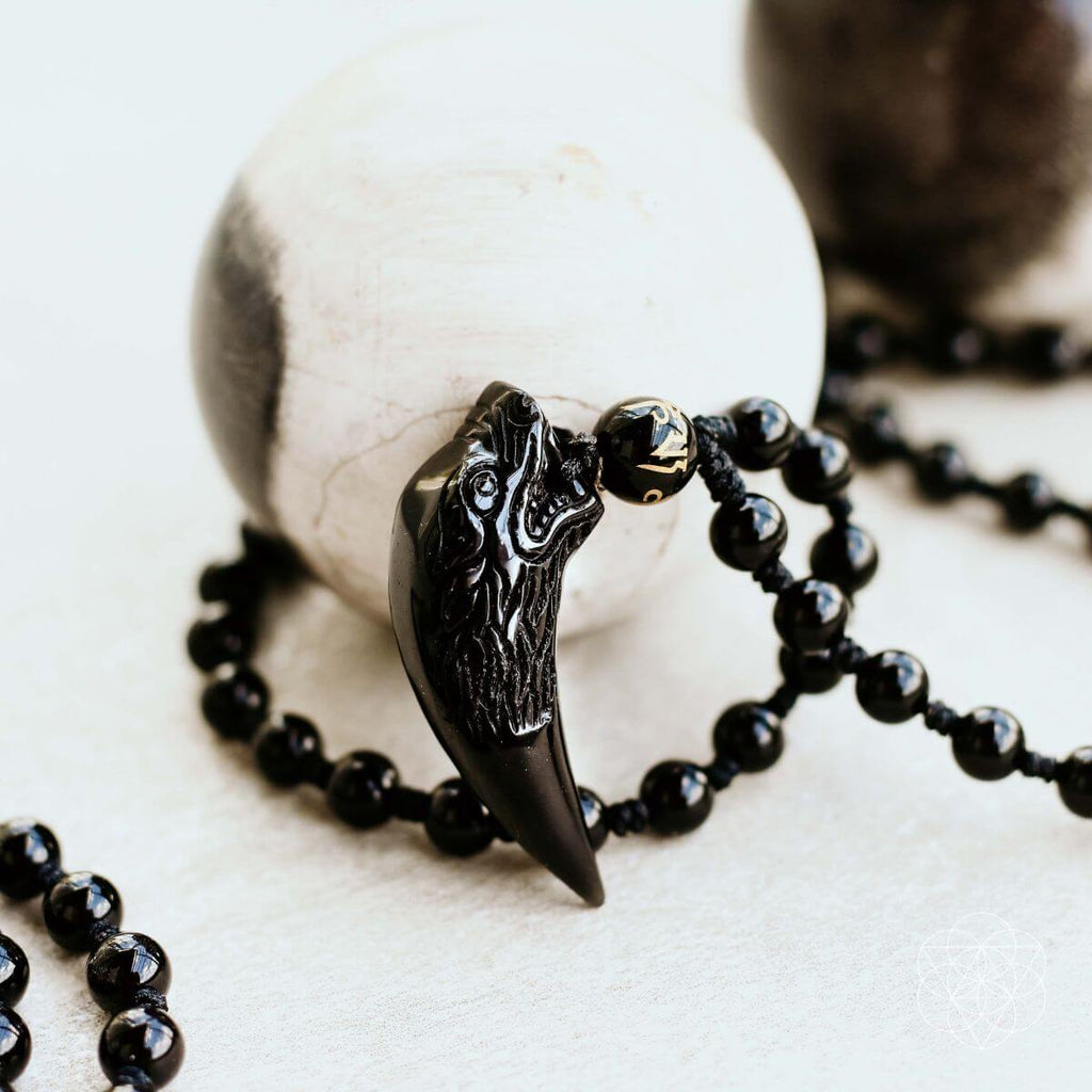 The Obsidian Wolf Pendant by Conscious Items