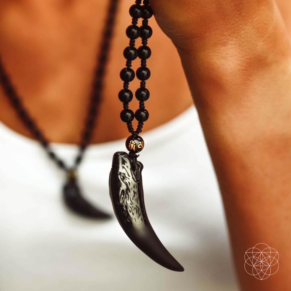 The Obsidian Wolf Pendant by Conscious Items